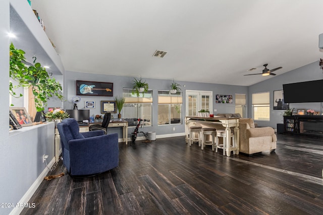 living room featuring ceiling fan, vaulted ceiling, french doors, and dark hardwood / wood-style flooring