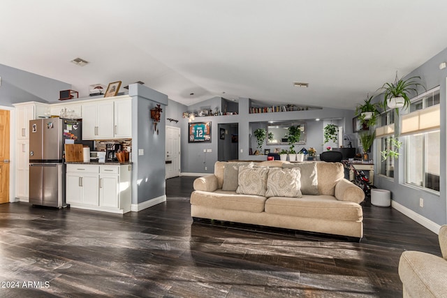 living room with lofted ceiling and dark hardwood / wood-style flooring