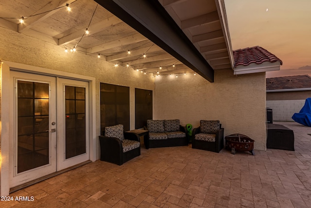 patio terrace at dusk with french doors