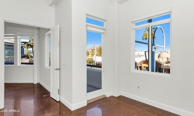 foyer entrance featuring plenty of natural light