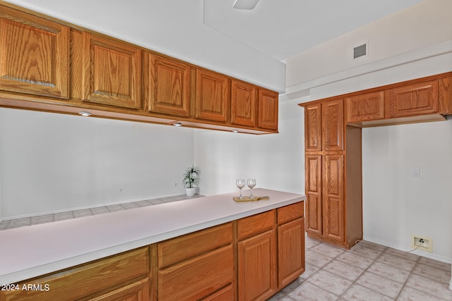 kitchen with light tile floors