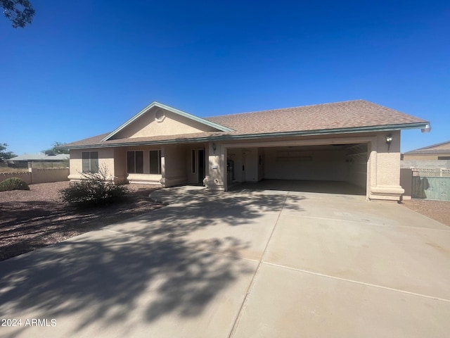 single story home featuring a garage