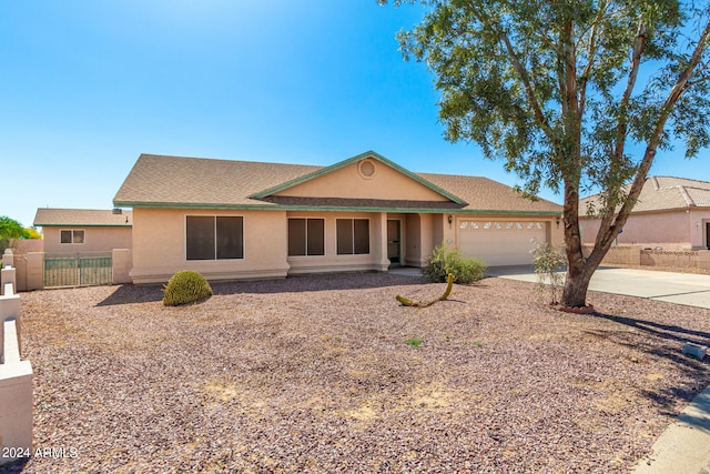 single story home with a garage