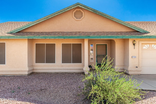 exterior space with a garage