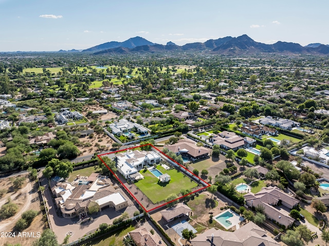 drone / aerial view featuring a mountain view