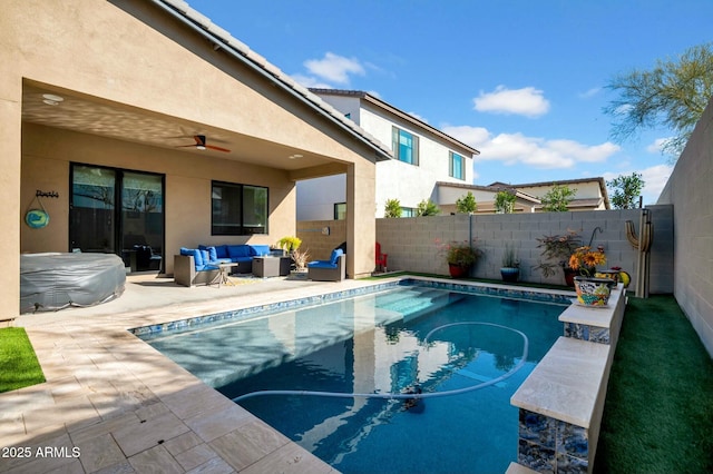 view of pool with an outdoor hangout area, a patio, and ceiling fan