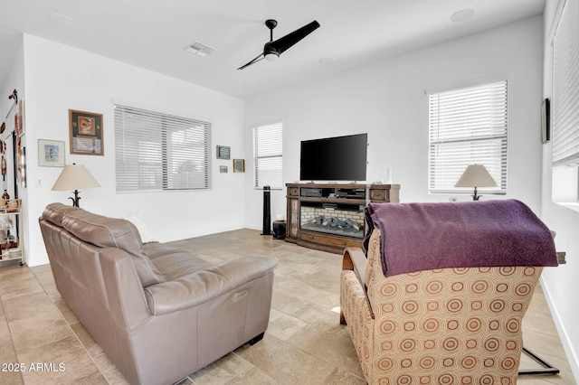 living room featuring ceiling fan