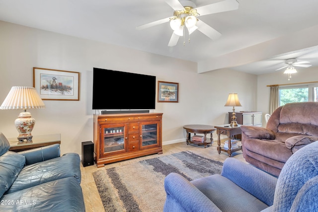 living room featuring ceiling fan