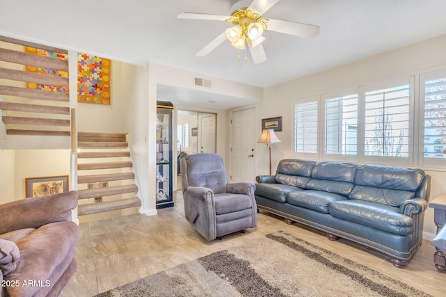 living room featuring ceiling fan