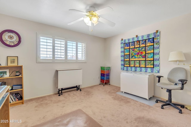 office featuring light colored carpet and ceiling fan