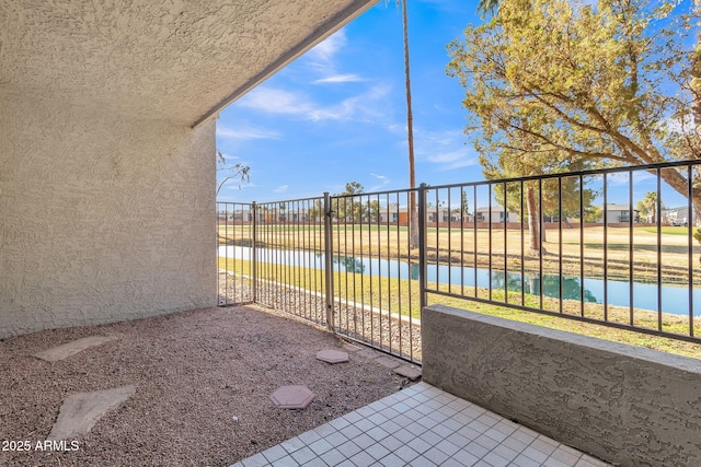 view of patio / terrace featuring a water view