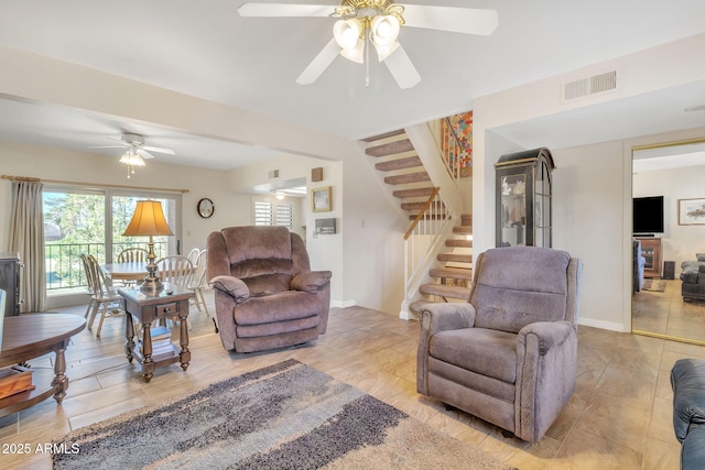 living room with ceiling fan