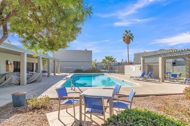 view of swimming pool featuring a pergola and a patio area