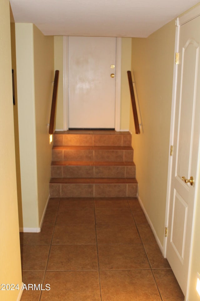 stairway with tile floors