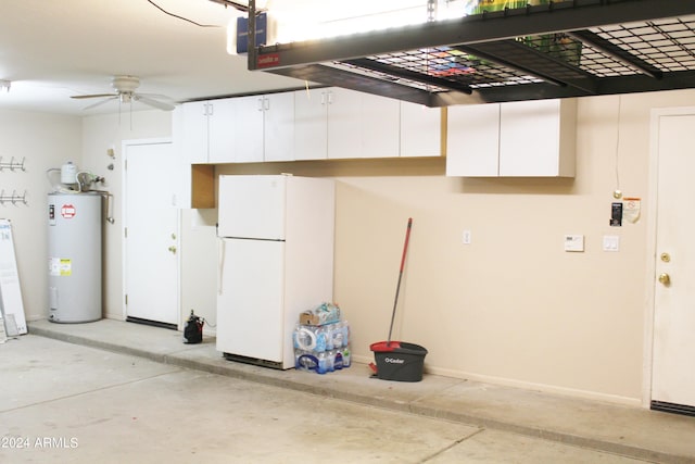 garage with water heater, ceiling fan, and white refrigerator