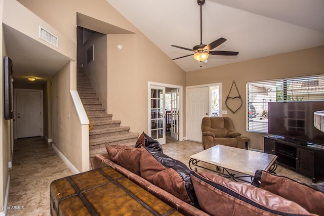 living room featuring ceiling fan and vaulted ceiling