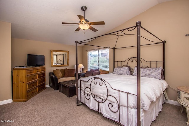 carpeted bedroom with vaulted ceiling and ceiling fan