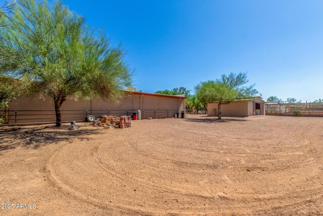 8043 E Laurel St, Mesa, AZ 85207 - view of yard with an outdoor structure and an exterior structure
