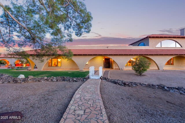 8043 E Laurel St, Mesa, AZ 85207 - mediterranean / spanish home with stucco siding, a tile roof, and a yard