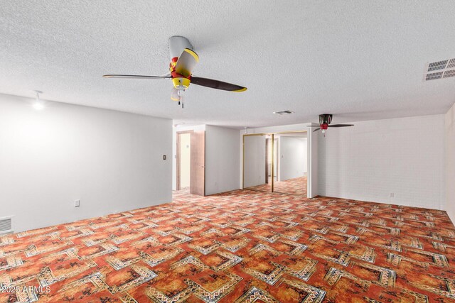 8043 E Laurel St, Mesa, AZ 85207 - unfurnished room with ceiling fan and a textured ceiling