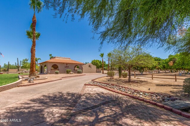 8043 E Laurel St, Mesa, AZ 85207 - view of front of house featuring decorative driveway and stucco siding