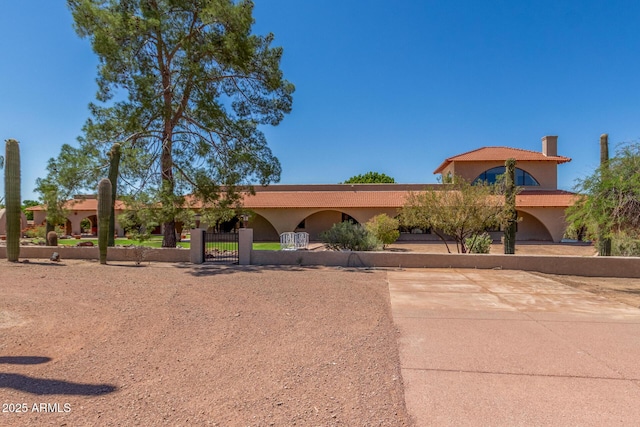 8043 E Laurel St, Mesa, AZ 85207 - view of front of house featuring a gate and stucco siding