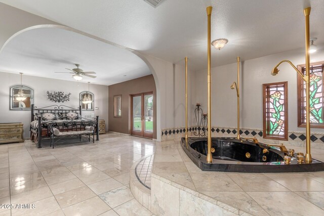 8043 E Laurel St, Mesa, AZ 85207 - entrance foyer featuring arched walkways, a ceiling fan, and french doors