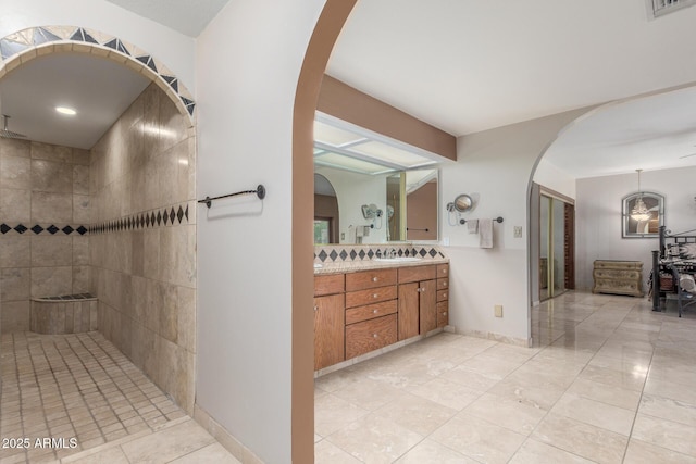 8043 E Laurel St, Mesa, AZ 85207 - full bath featuring double vanity, a walk in shower, and tile patterned flooring