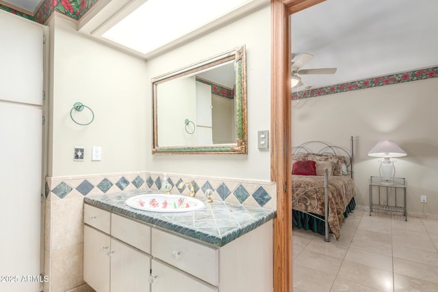 8043 E Laurel St, Mesa, AZ 85207 - ensuite bathroom with ceiling fan, vanity, and tile patterned flooring