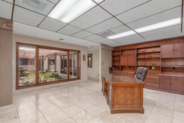 8043 E Laurel St, Mesa, AZ 85207 - home office featuring light tile patterned floors and a paneled ceiling