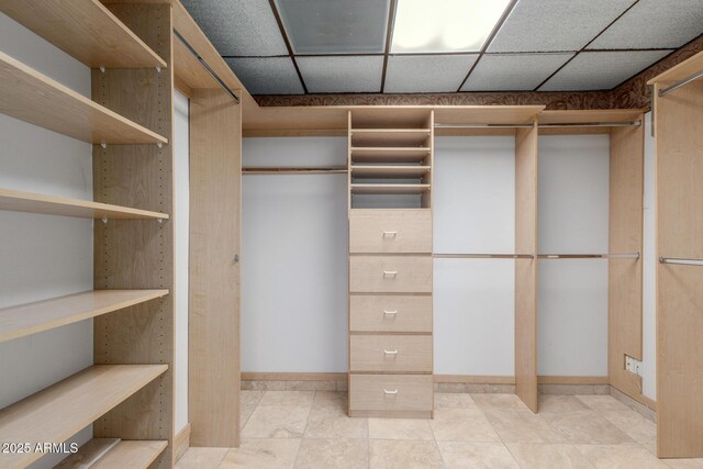 8043 E Laurel St, Mesa, AZ 85207 - spacious closet with a drop ceiling and light tile patterned floors