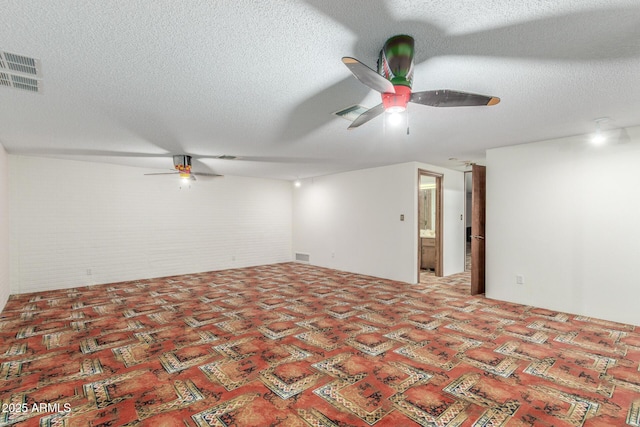 8043 E Laurel St, Mesa, AZ 85207 - unfurnished room with ceiling fan and a textured ceiling