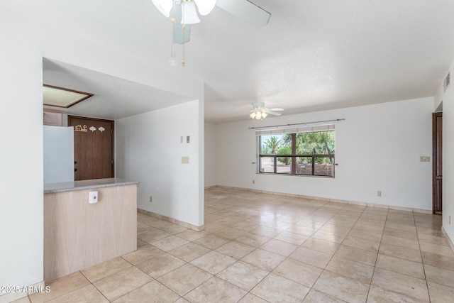 8043 E Laurel St, Mesa, AZ 85207 - unfurnished living room featuring ceiling fan and light tile patterned floors