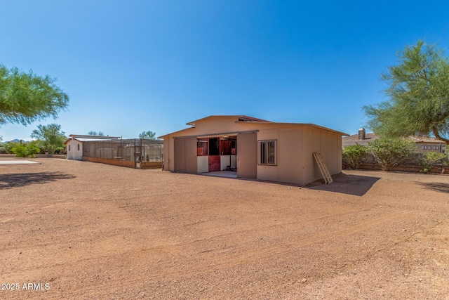 8043 E Laurel St, Mesa, AZ 85207 - rear view of house featuring an outdoor structure