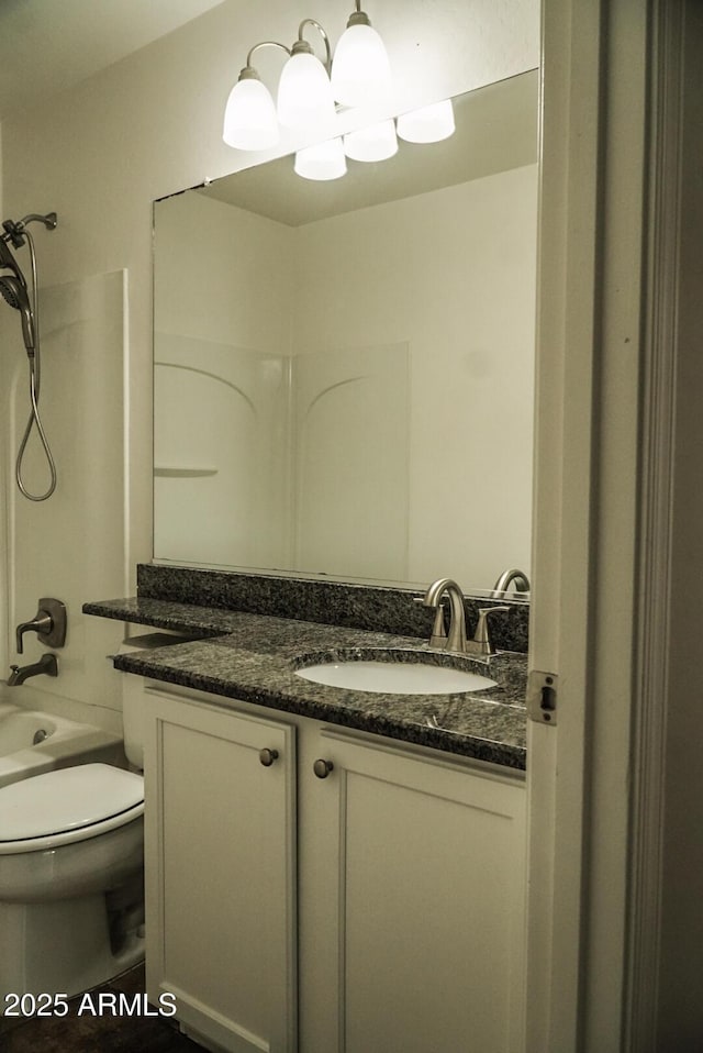 full bathroom with vanity, toilet, and shower / bathing tub combination