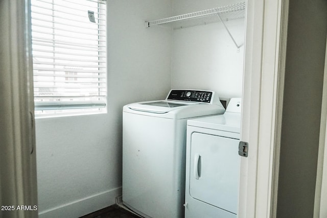 washroom featuring separate washer and dryer