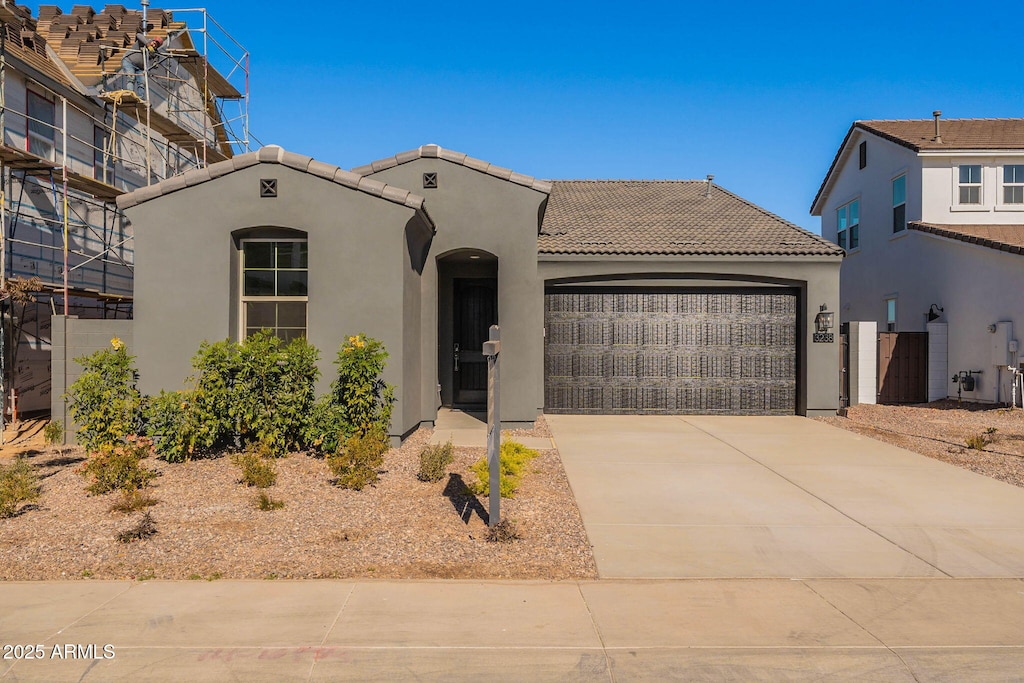 view of front of home featuring a garage