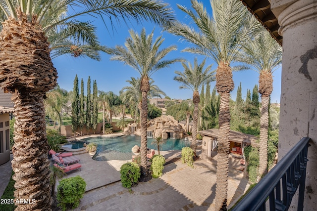 view of swimming pool featuring a patio