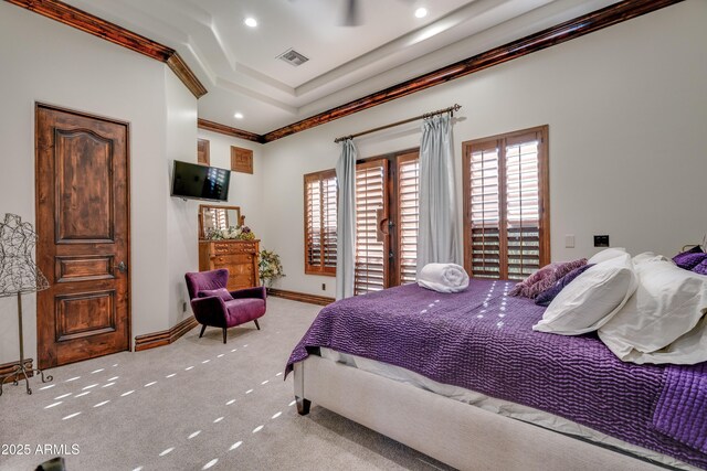 bedroom with light colored carpet and crown molding