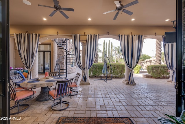 view of patio with ceiling fan