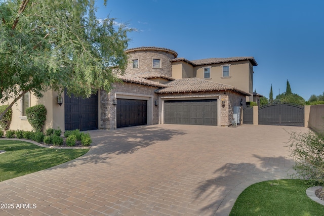 mediterranean / spanish-style house featuring a garage