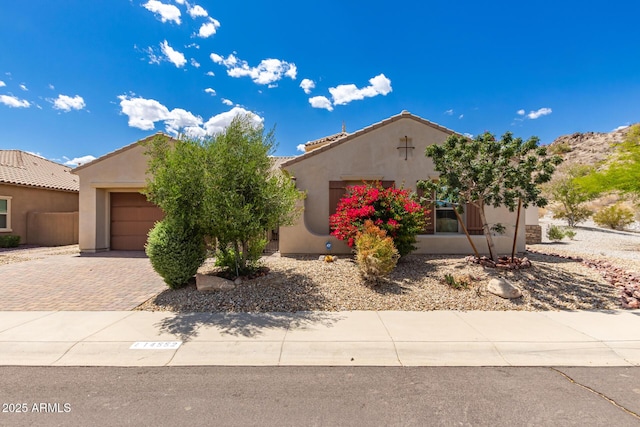 14552 S 182nd Dr, Goodyear, AZ 85338 - view of front of house featuring stucco siding, decorative driveway, and a garage