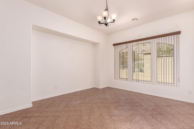 14552 S 182nd Dr, Goodyear, AZ 85338 - spare room with a notable chandelier, visible vents, and baseboards