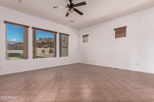 14552 S 182nd Dr, Goodyear, AZ 85338 - empty room with baseboards, a ceiling fan, and visible vents