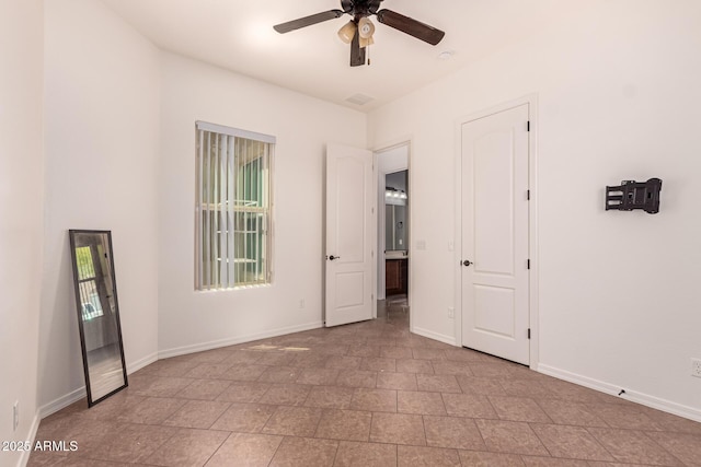 14552 S 182nd Dr, Goodyear, AZ 85338 - unfurnished bedroom featuring baseboards and a ceiling fan