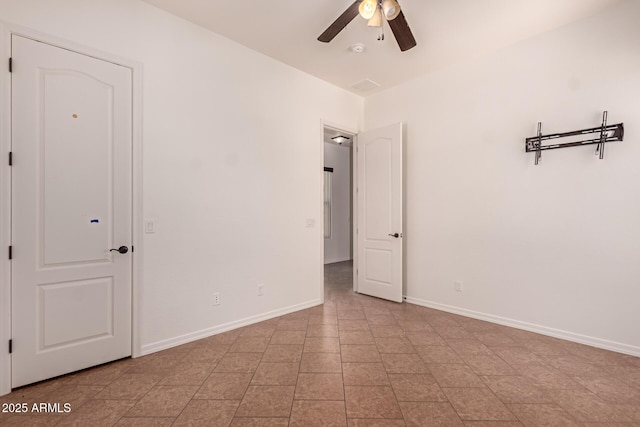 14552 S 182nd Dr, Goodyear, AZ 85338 - unfurnished bedroom featuring baseboards and ceiling fan