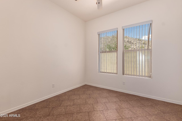 14552 S 182nd Dr, Goodyear, AZ 85338 - empty room with baseboards and ceiling fan