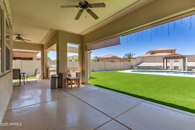 14552 S 182nd Dr, Goodyear, AZ 85338 - view of patio with a fenced backyard, a fenced in pool, and ceiling fan