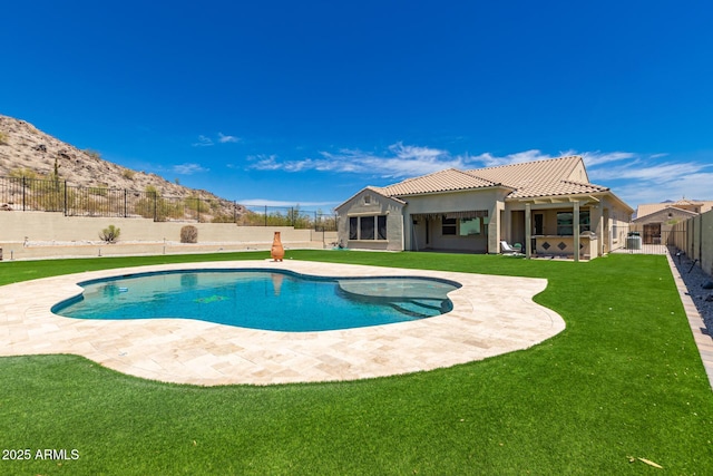 14552 S 182nd Dr, Goodyear, AZ 85338 - view of pool with a fenced backyard, a fenced in pool, a yard, and a patio area