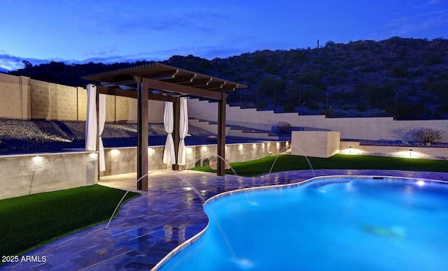 14552 S 182nd Dr, Goodyear, AZ 85338 - outdoor pool featuring a pergola, a fenced backyard, and a patio area